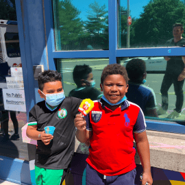 Two students enjoying ice cream.